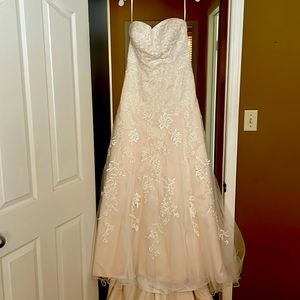 David’s bridal gown.  Size 12, altered to 11.  Ivory.